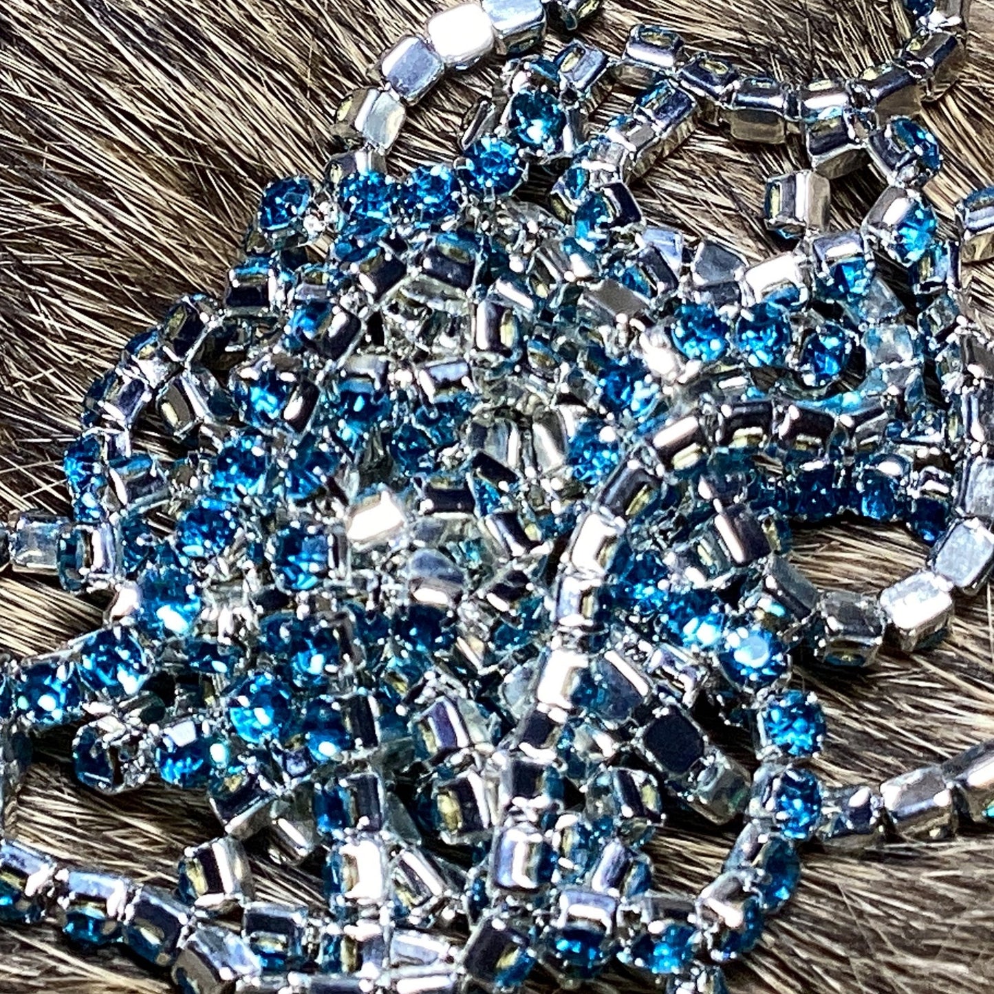 Powder blue rhinestone on silver chain