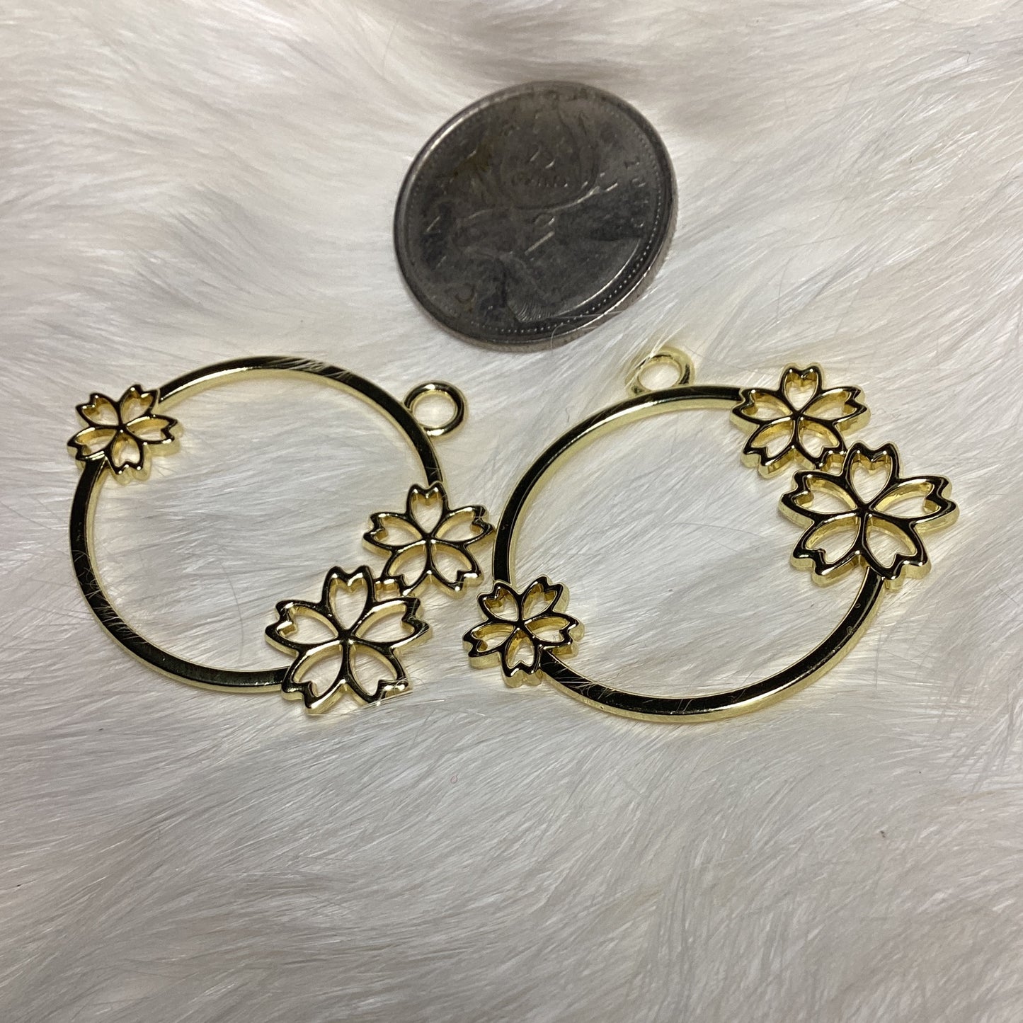 Gold plated circle w flowers