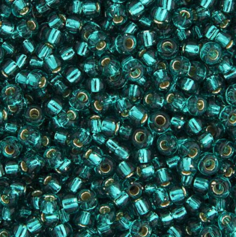 11/0 in Silver Lined Teal Caribbean 23g (2425V)