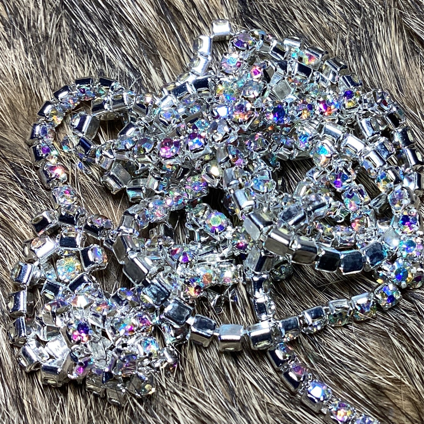 Multicoloured rhinestone on silver chain