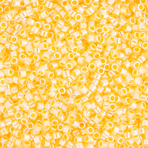 11/0 RD Crystal Yellow Ceylon Lined-Dyed (0233v)