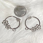 Silver plated circle with flowers